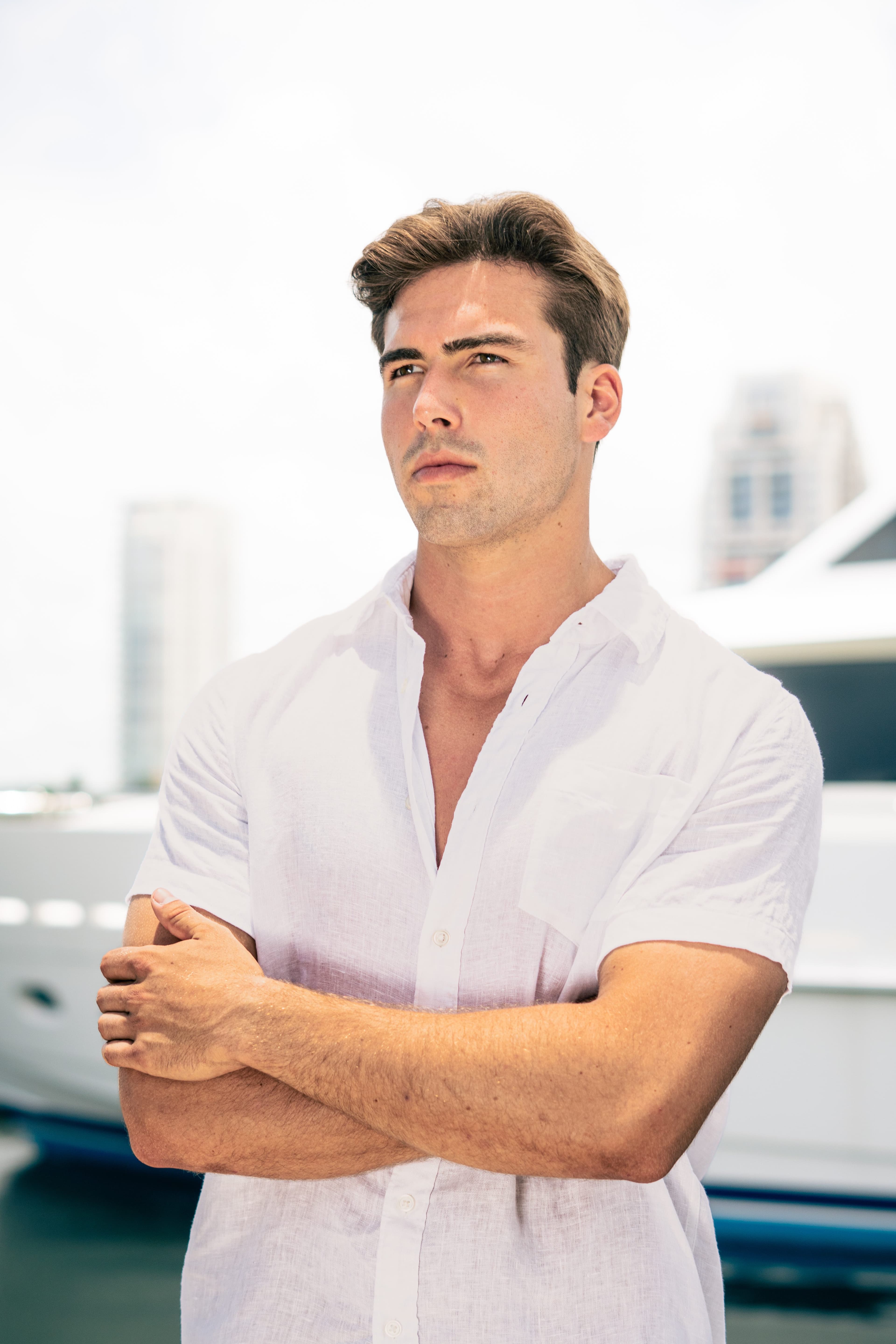 Christian Utne arms crossed at the marina